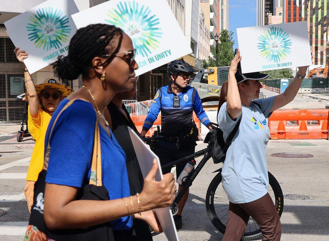 Miami Police bike patrolman keeps marchers safe as120 people participated in the Miami Unity March that brought together Miami's civic, faith, cultural, and nonprofit communities to reaffirm the importance of unity on Sunday, April 19, 2026, in Miami, Florida.