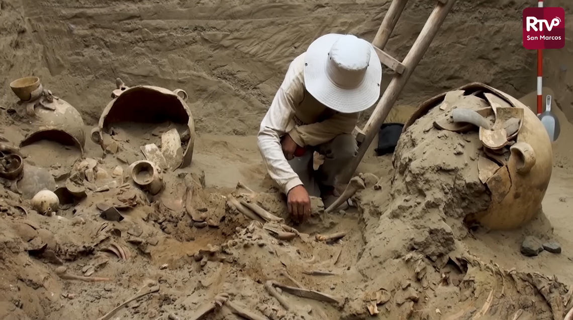 Some of the skeletons and broken pottery vessels found in the tomb.