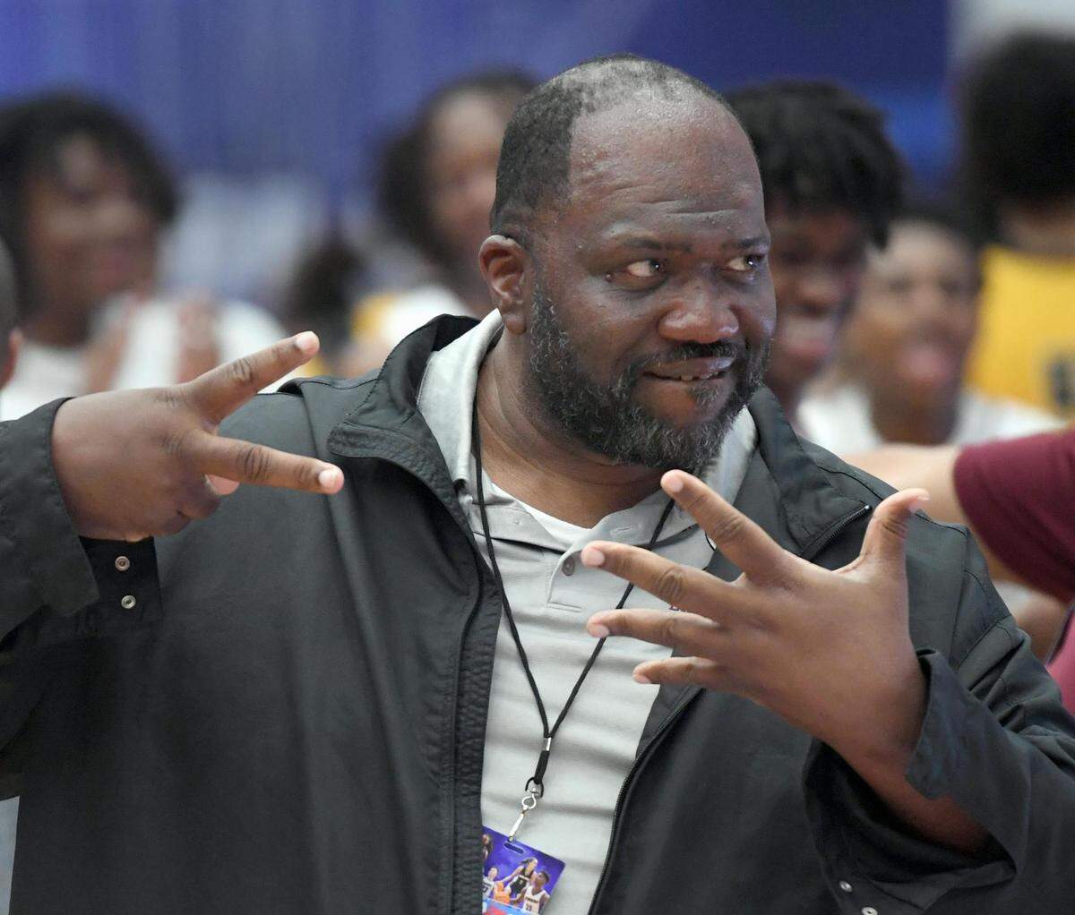 Norland’s head coach Lawton Williams III holds up seven fingers representing seven state titles for Norland after beating Blake in the Class 5A final during the Florida High School State Championships at the RP Funding Center in Lakeland, Fl on Friday March 8, 2024. Norland defeated Blake 61-48 to win the State Title. Scott Wheeler | Photo