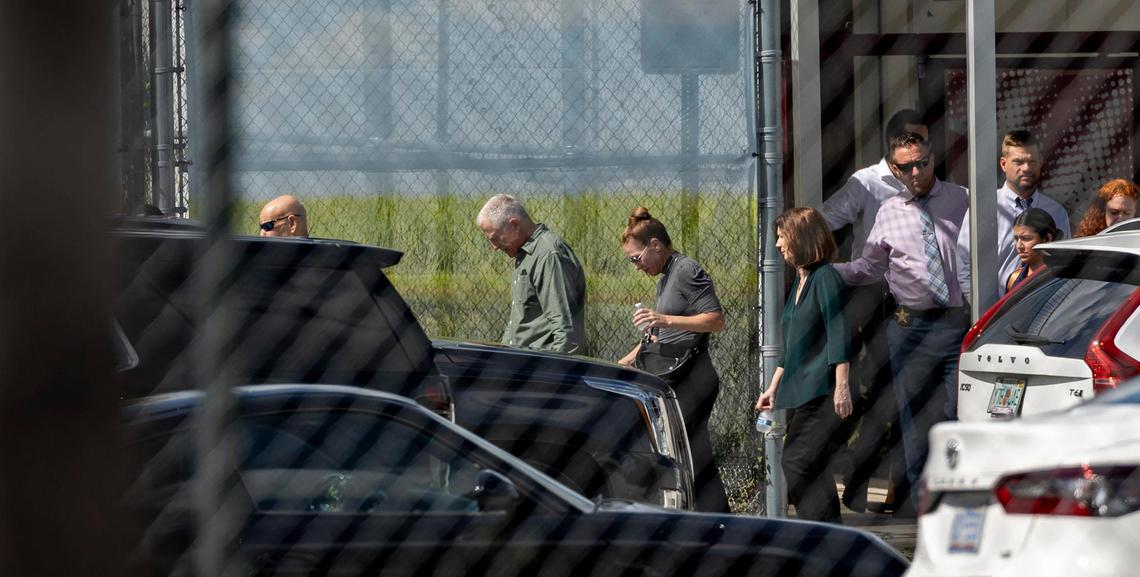 Parkland, Florida - July 5, 2023 - Family members of the shooting victims at Marjory Stoneman Douglas High School visit the scene of the crime escorted by police and other officials. The building will be demolished now that the trials are over.