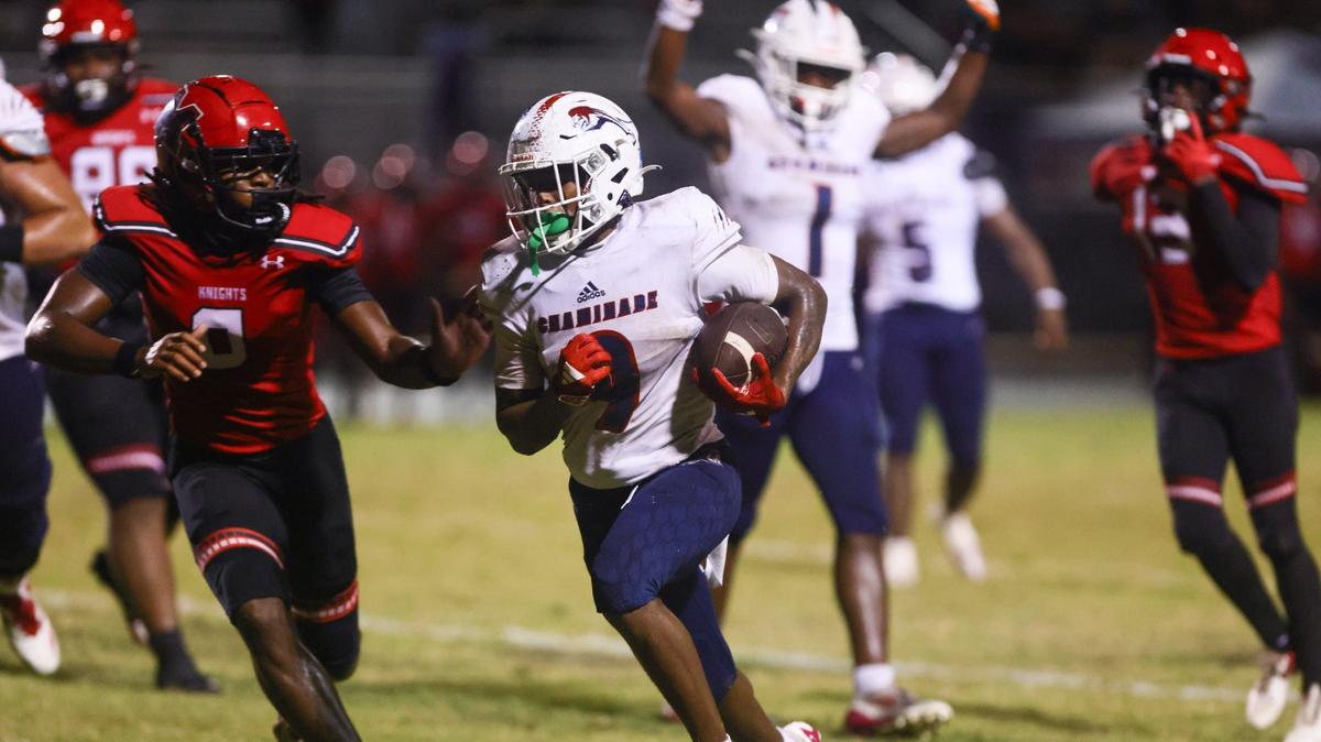 Chaminade-Madonna Lions running back Camari Hall (9) runs for a touchdown against the Chaminade-Madonna Lions during the second quarter of a high school football game at Coconut Creek High School in Coconut Creek, Florida, Saturday, October 5, 2024.