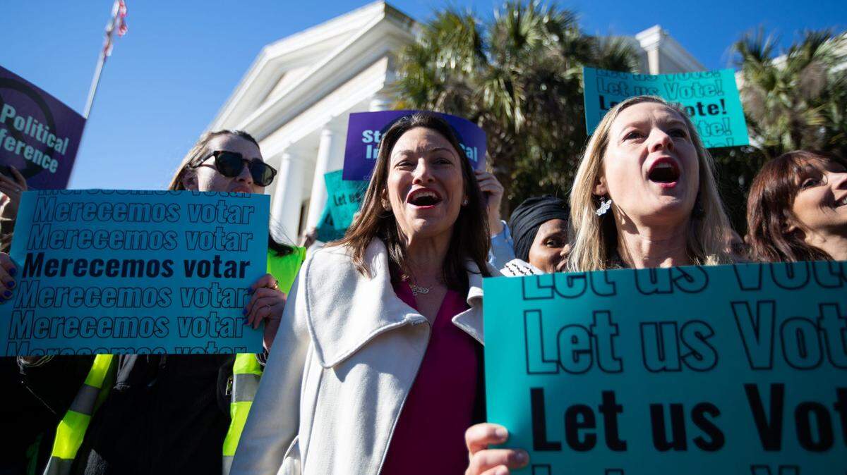 Abortion-rights and anti-abortion activists voice their opinions outside the Florida Supreme Court after the Court heard arguments on the proposed abortion amendment in February.