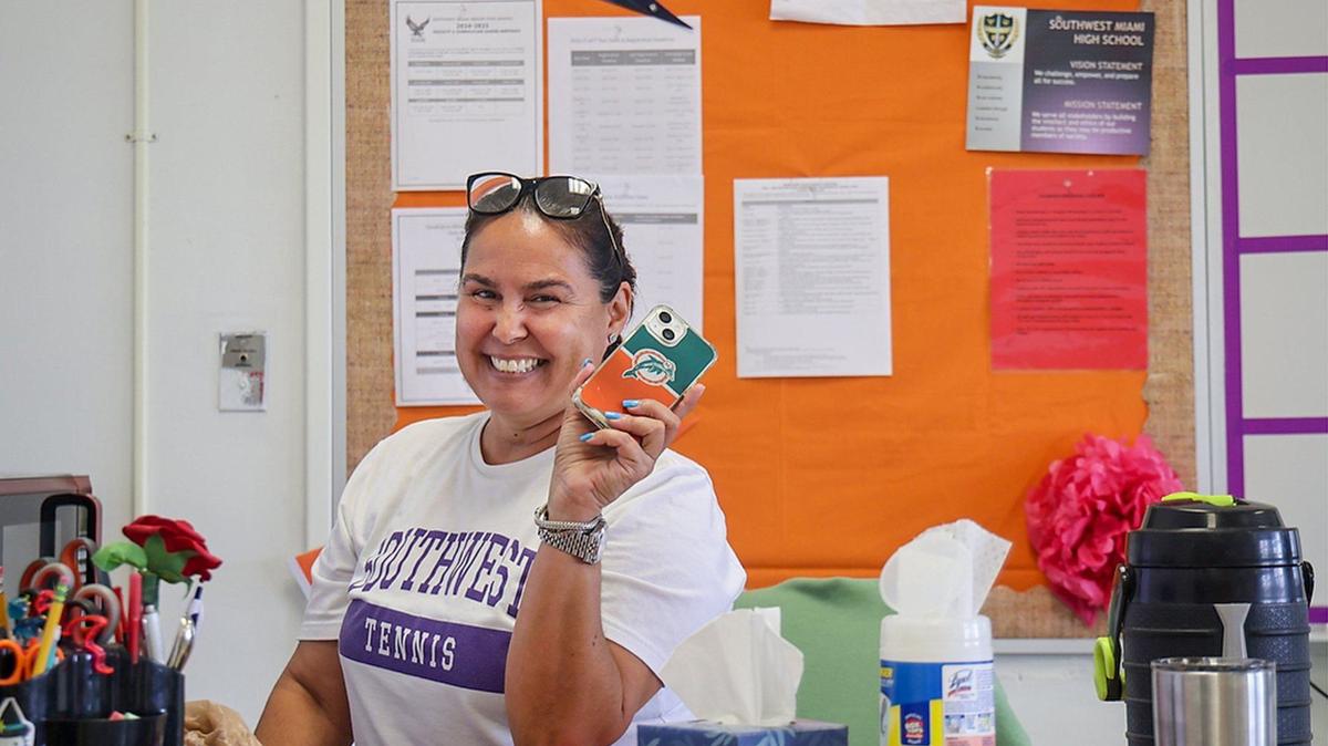 Intensive reading teacher Mailyn Lodos is a proud Dolphin fan. However, students’ phones are not allowed in her classroom and be placed in a particular bin during class. Southwest Miami Senior High School teachers prepared their classrooms for the start of school, as well as supplies and items for the upcoming school year, on Wednesday, August 8, 2024, in Miami, Florida.