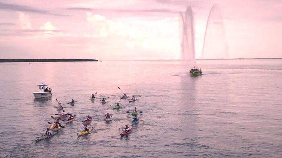 Kayakers with Christopher Columbus High School’s Castaways Against Cancer approach Bear Cut Bridge, Key Biscayne in 2018. They are partnering with Sylvester Comprehensive Cancer Center at the University of Miami to raise funds to fight cancer.