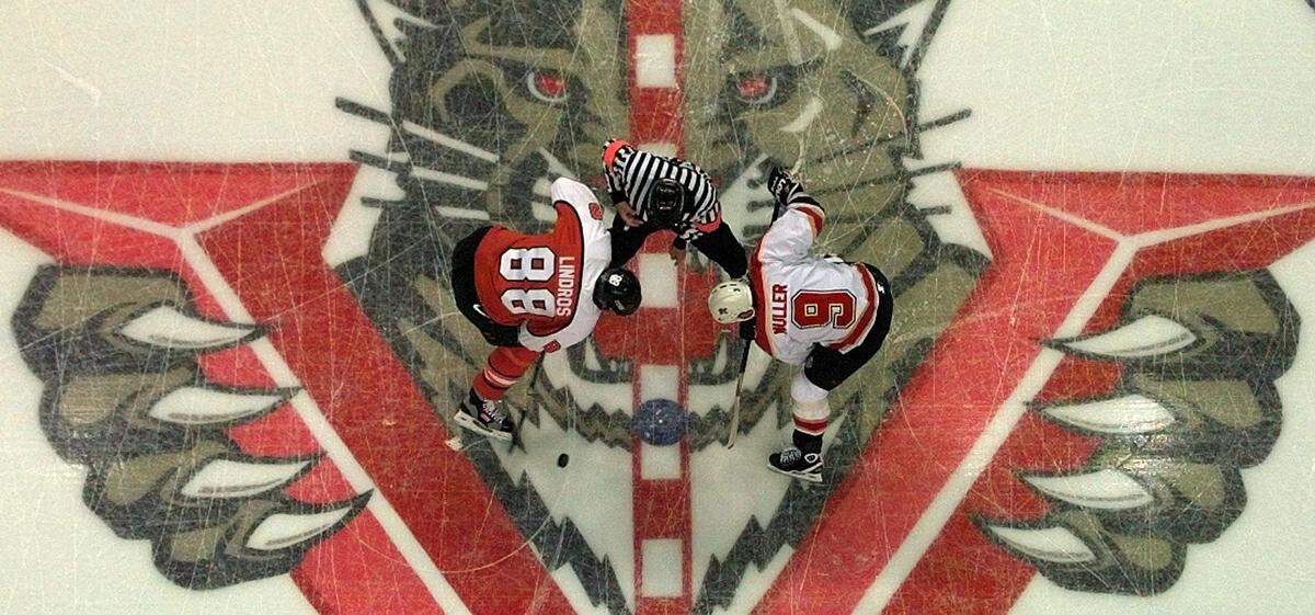 Panther killer Eric Lindros and Panthers center Kirk Muller on a center ice face-off during the Panthers last game at Miami Arena, a 7-3 loss to the Philadelphia Flyers on April 16, 1998. Lindros had two goals and an assist.