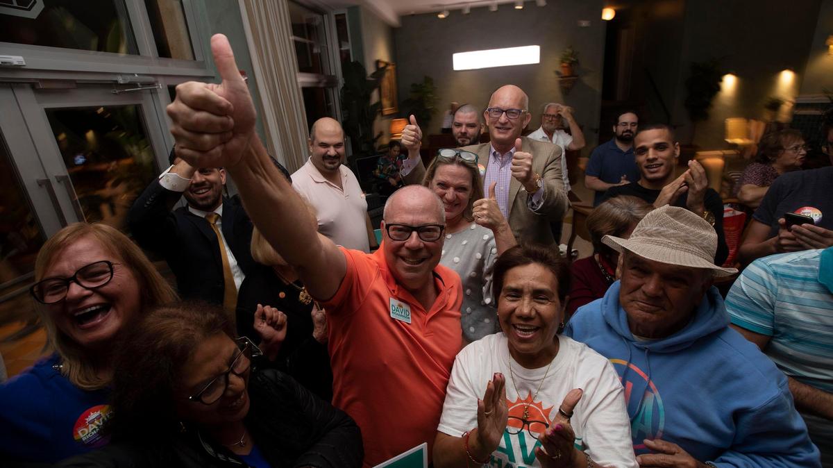 David Richardson, candidate for Miami Beach City Commissioner, Group 6, celebrates with his followers as he watches election returns at the Palihouse Miami Beach on Tuesday, November 19, 2019.