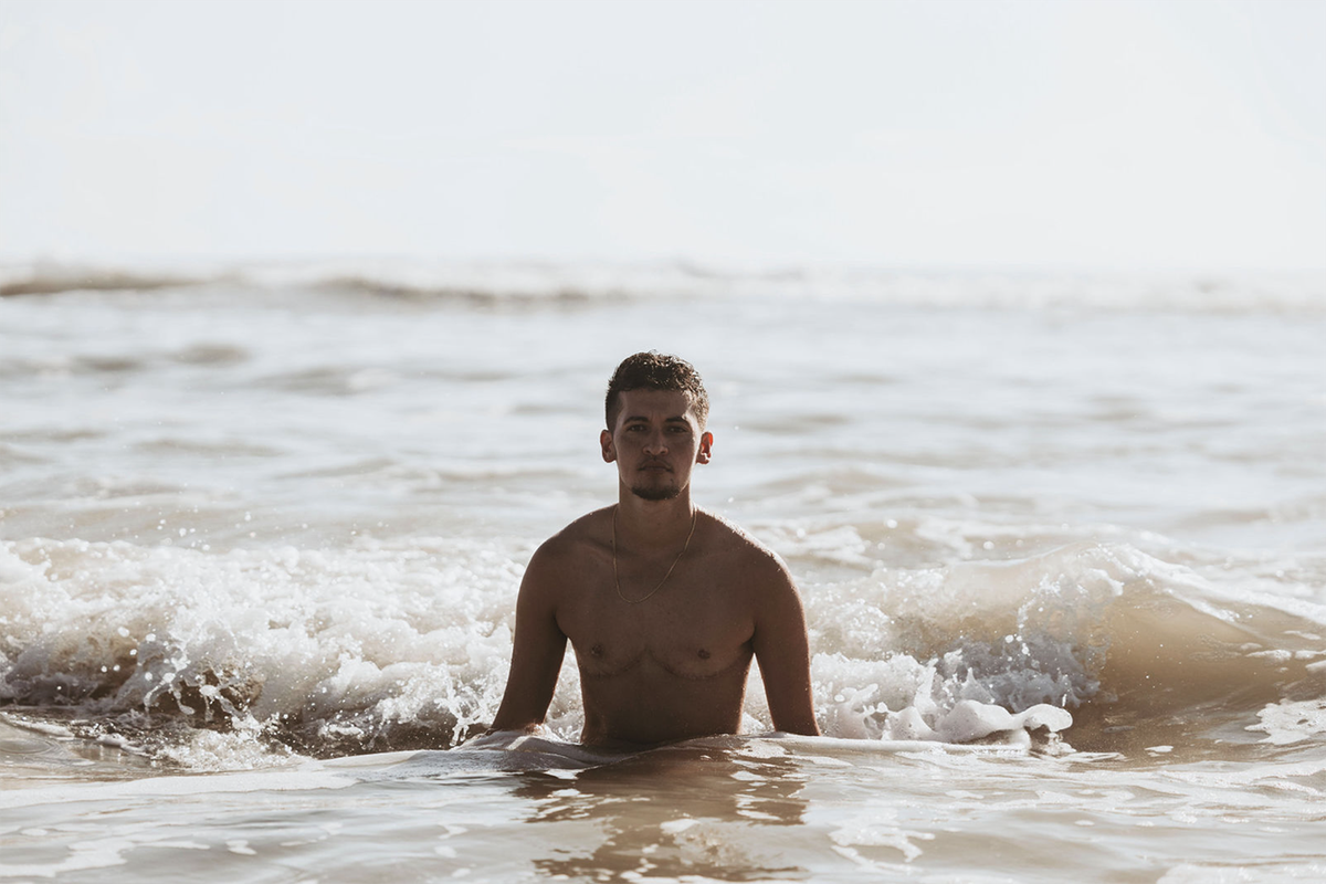 A photograph titled “Myles’ Homecoming” is featured in a new art exhibition hosted at Coral Gables United Church of Christ and curated by artist David Gary Lloyd. The show “The Reach of Light” explores how queer art shown in a religious setting can be used to foster dialogue and acceptance.
