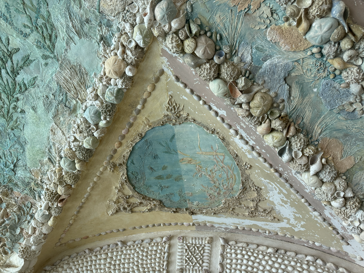 Conservators will use a $750,000 grant from the National Park Services to conserve the ceiling mural inside the grotto at Vizcaya in Coconut Grove. On the left, conservators completed a test run to show how vibrant the original colors were before years of humidity and harsh weather damaged the mural.