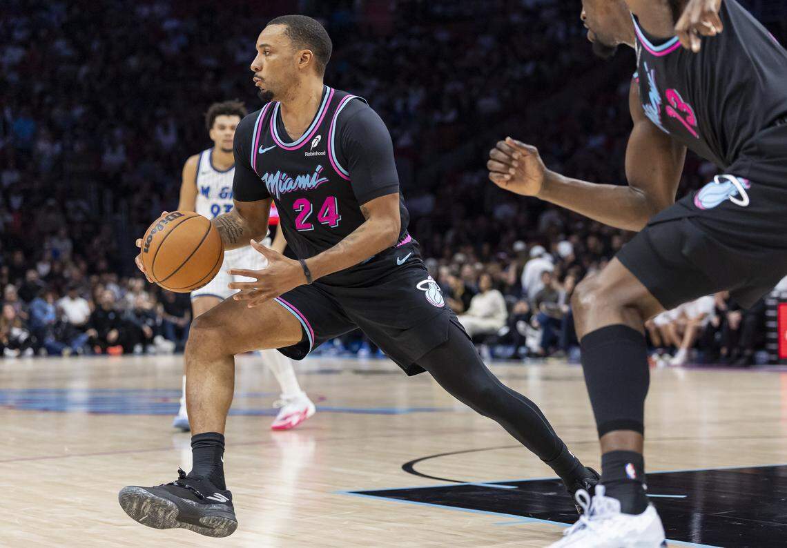 Miami Heat guard Norman Powell (24) drives the ball down the court against the Orlando Magic in the second half of their NBA game at the Kaseya Center on March 14, 2026, in Miami.