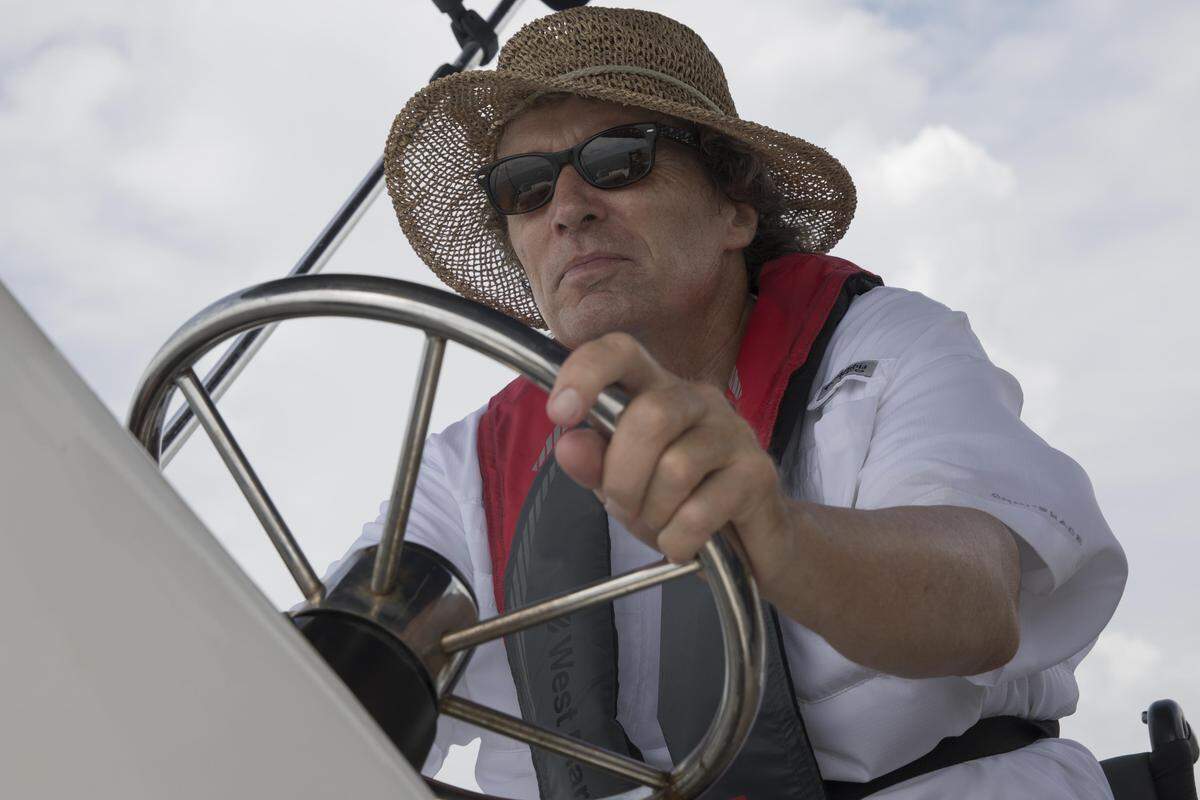Harry Horgan, president of Shake-A-Leg Miami, sails in Biscayne Bay on Friday, June 15, 2018.