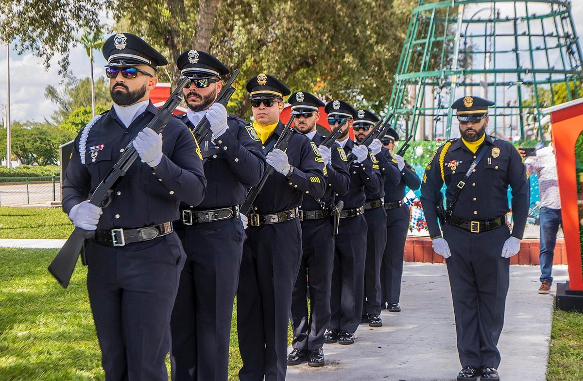 The Hialeah Police Department honor guard get ready for the 21 Gun Salute during the Veterans Day Ceremony hosted by the City of Hialeah, at the Veterans Park, in Palm Avenue, on Friday November 1, 2022.