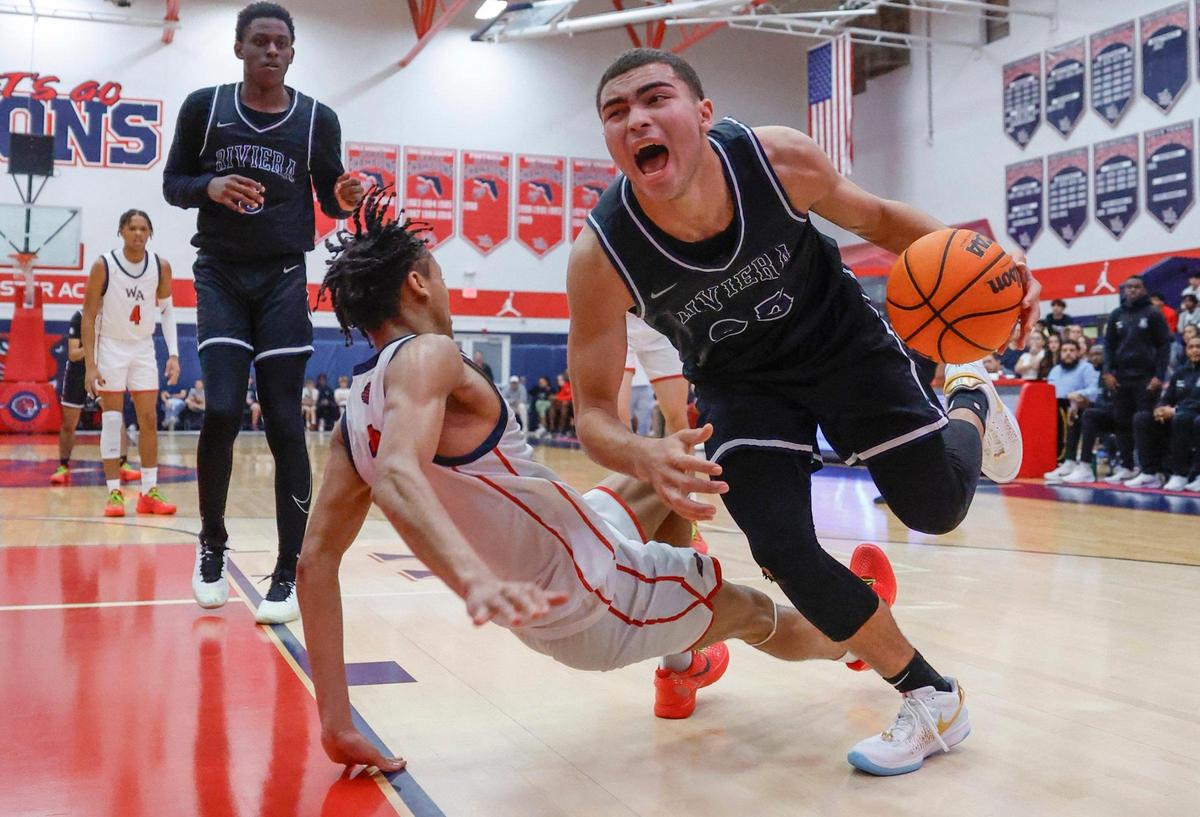 Riviera Prep Bulldogs guard Dante Allen (35) drives the ball as Westminster Academy Lions guard Ethan Bertrand (2) defends during boy’s basketball FHSAA Regional Finals at Westminster Academy School in Fort Lauderdale, Fl on Friday, February 23, 2024.