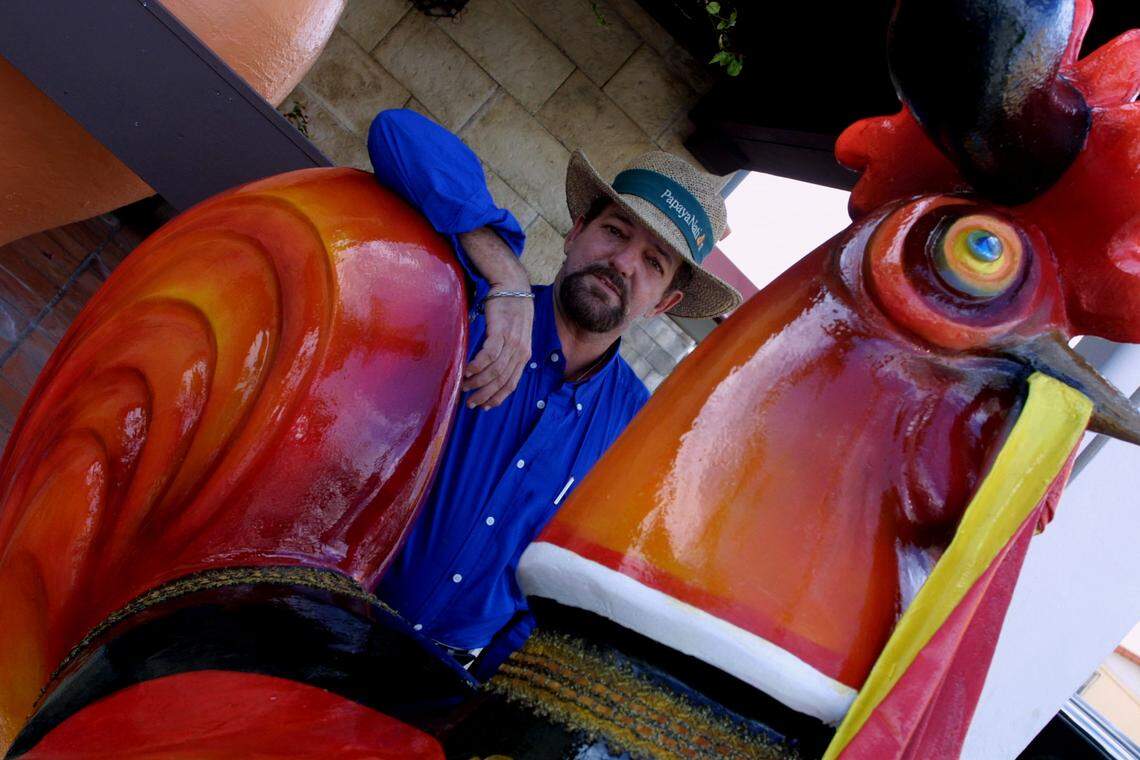 Creator of the “Rooster Walk” art project Pedro Damián poses with one of the project’s rooster sculptures in December 2002. The project was created with the help of local businesses and the city of Miami to set several roosters with different themes along SW 8th Street and Flagler Street in Little Havana.