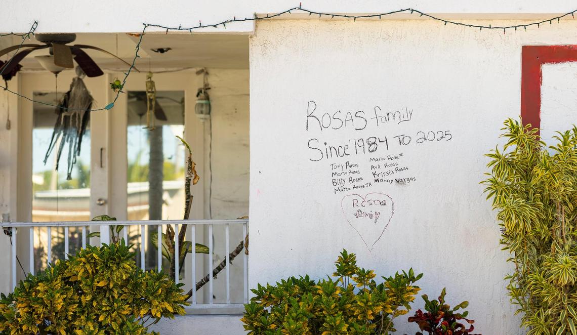 A message is written on the wall of a home in the Li’l Abner Mobile Home Park on Friday, March 7, 2025, in Sweetwater, Florida.