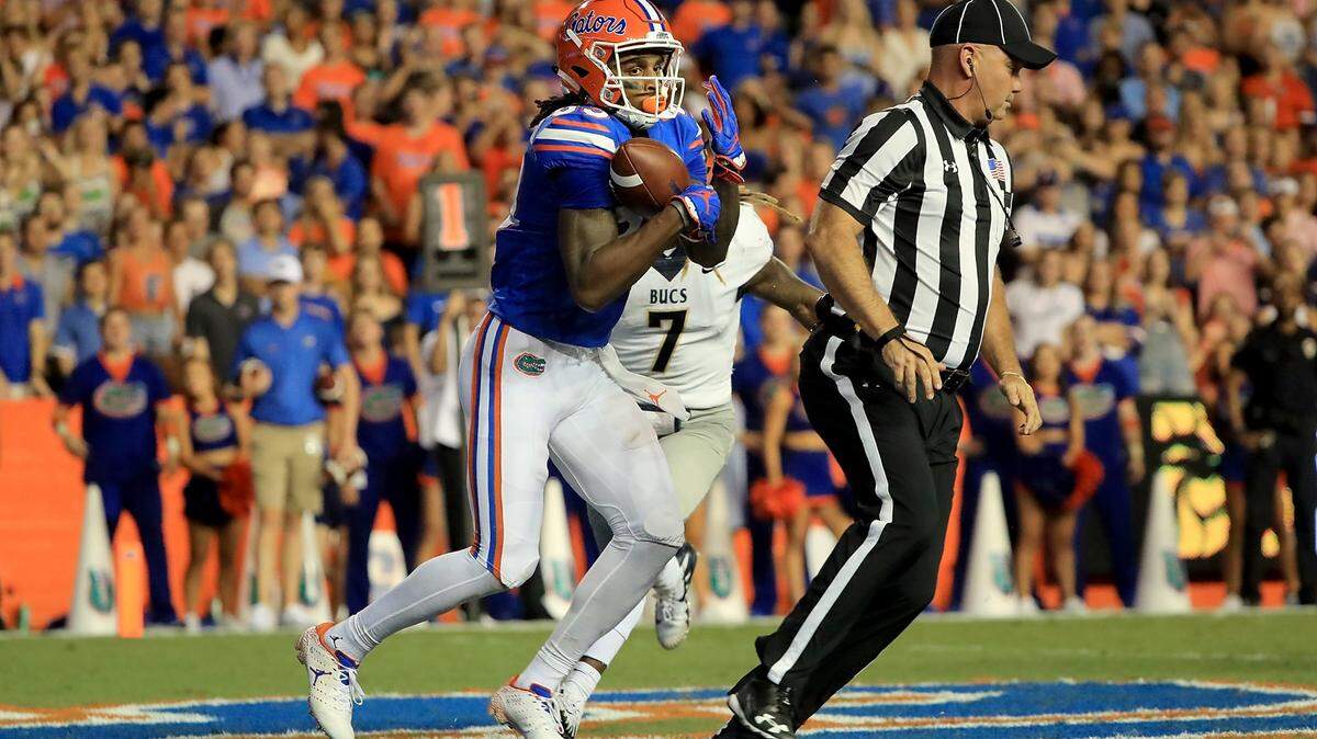 Tyrie Cleveland #89 of the Florida Gators crosses the goal line for a touchdown during the game against the Charleston Southern Buccaneers at Ben Hill Griffin Stadium on September 1, 2018 in Gainesville, Florida.