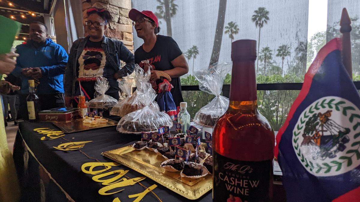 Vendors share bites of Caribbean black cake at the inaugural Rum Cake and Caribbean Black Cake festival in 2022 at the Island SPACE Caribbean Museum.