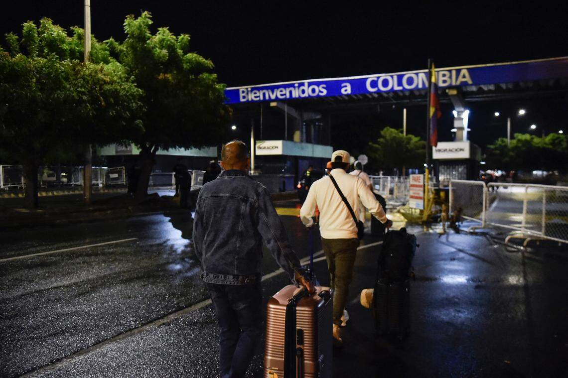 Venezuelans leaving their country arrive at the border crossing in Cucuta, Colombia, on January 3, 2026.