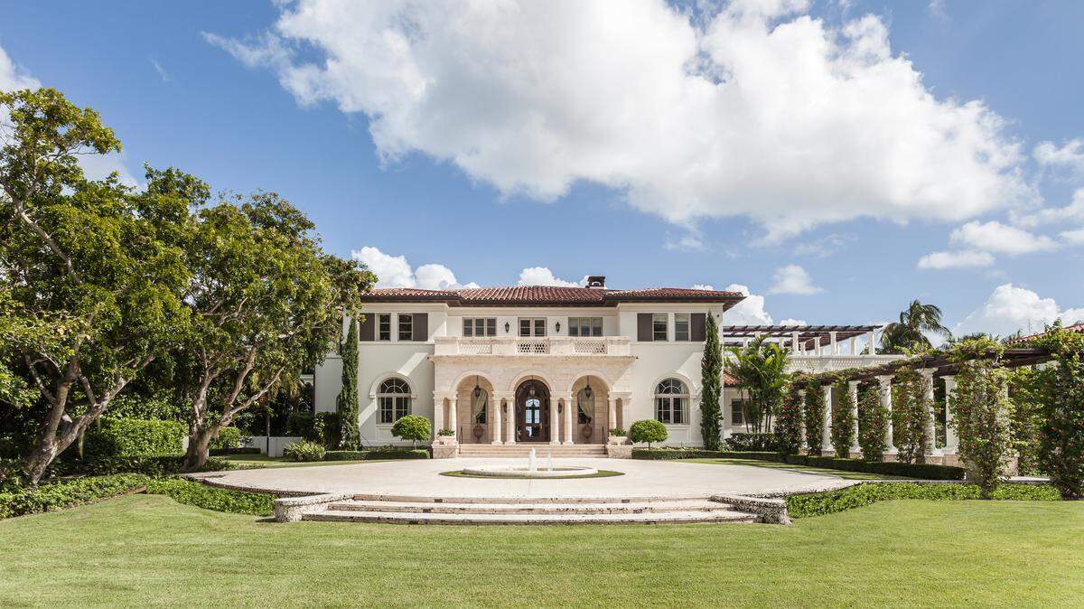 The two-story estate boasts six bedrooms, seven bathrooms and two half-bathrooms on a 62,000-square-foot lot.