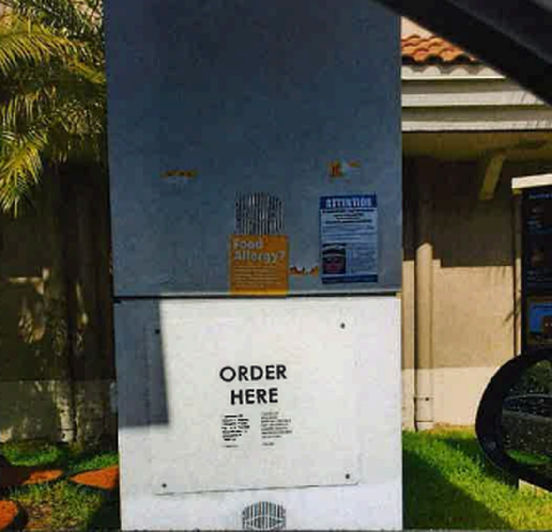 An image filed in Broward County Circuit Court shows a flier (top right) bashing Pembroke Park Mayor Geoffrey Jacobs that was taped to a McDonald’s drive-thru.