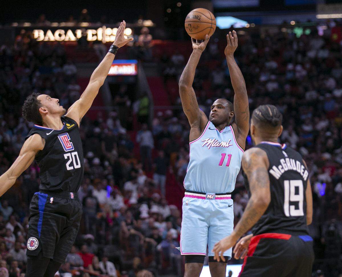 Miami Heat guard Dion Waiters (11) hits a three pointer in the first quarter as the Miami Heat host the LA Clippers at the AmericanAirlines Arena on Friday, January 24, 2020.