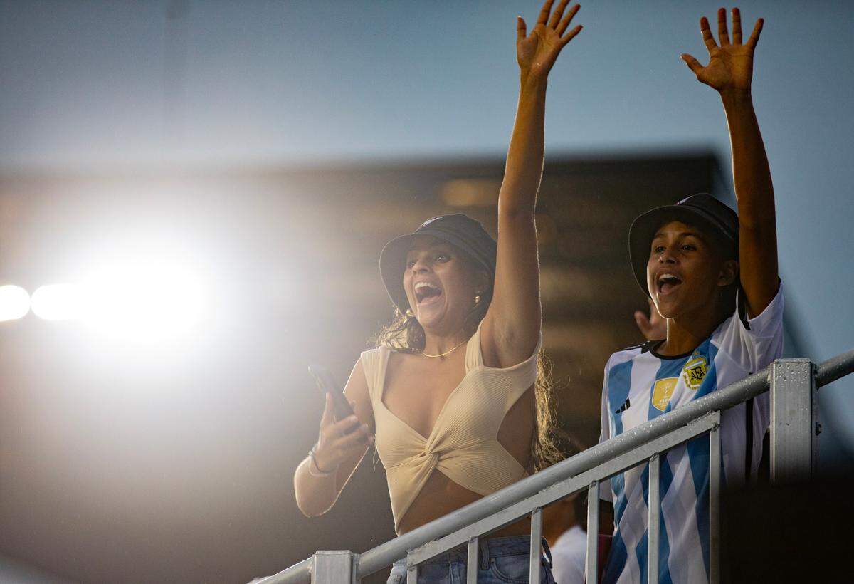 Attendees cheer and wave during The Unveil event, where Lionel Messi was welcomed to MLS and the Inter Miami CF team, at DRV PNK Stadium on Sunday, July 16, 2023 in Fort Lauderdale, Fla.