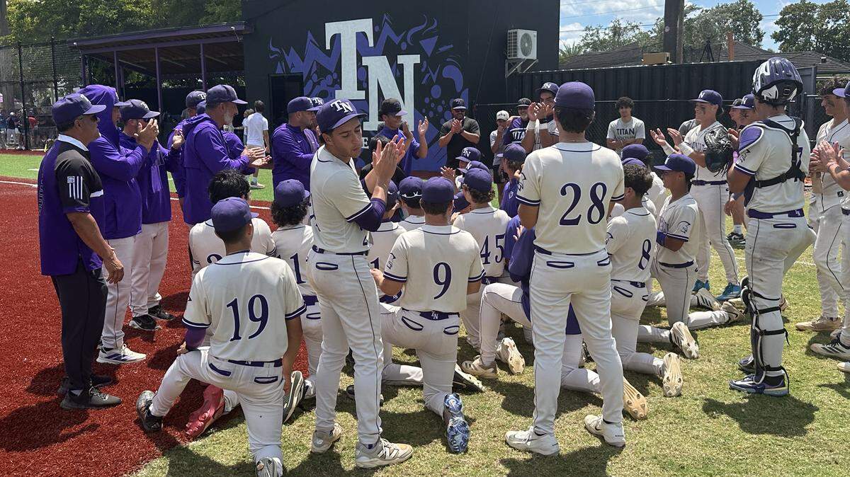 The True North baseball team celebrates after beating Palmer Trinity on Saturday in the second game of the Region 4-2A semifinal series at Glades Middle School in Miami, Fla.