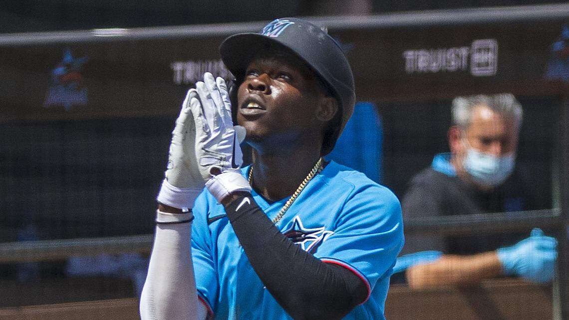Miami Marlins second baseman Jazz Chisholm (2) scores after hitting a solo home run against the New York Mets during the fifth inning of their spring training baseball game at Roger Dean Chevrolet Stadium on Wednesday, March 17, 2021 in Jupiter, Florida.