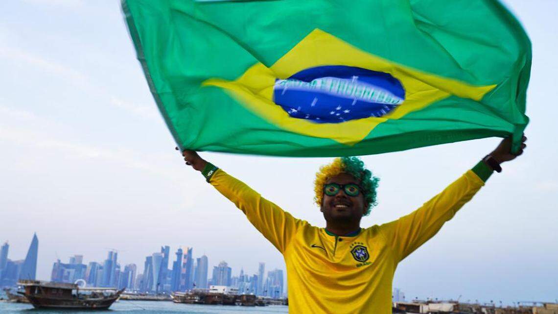 A Brazilian fan in Doha, Qatar, is ready for the 2022 World Cup, which kicks off Nov. 20 and runs through Dec. 18.