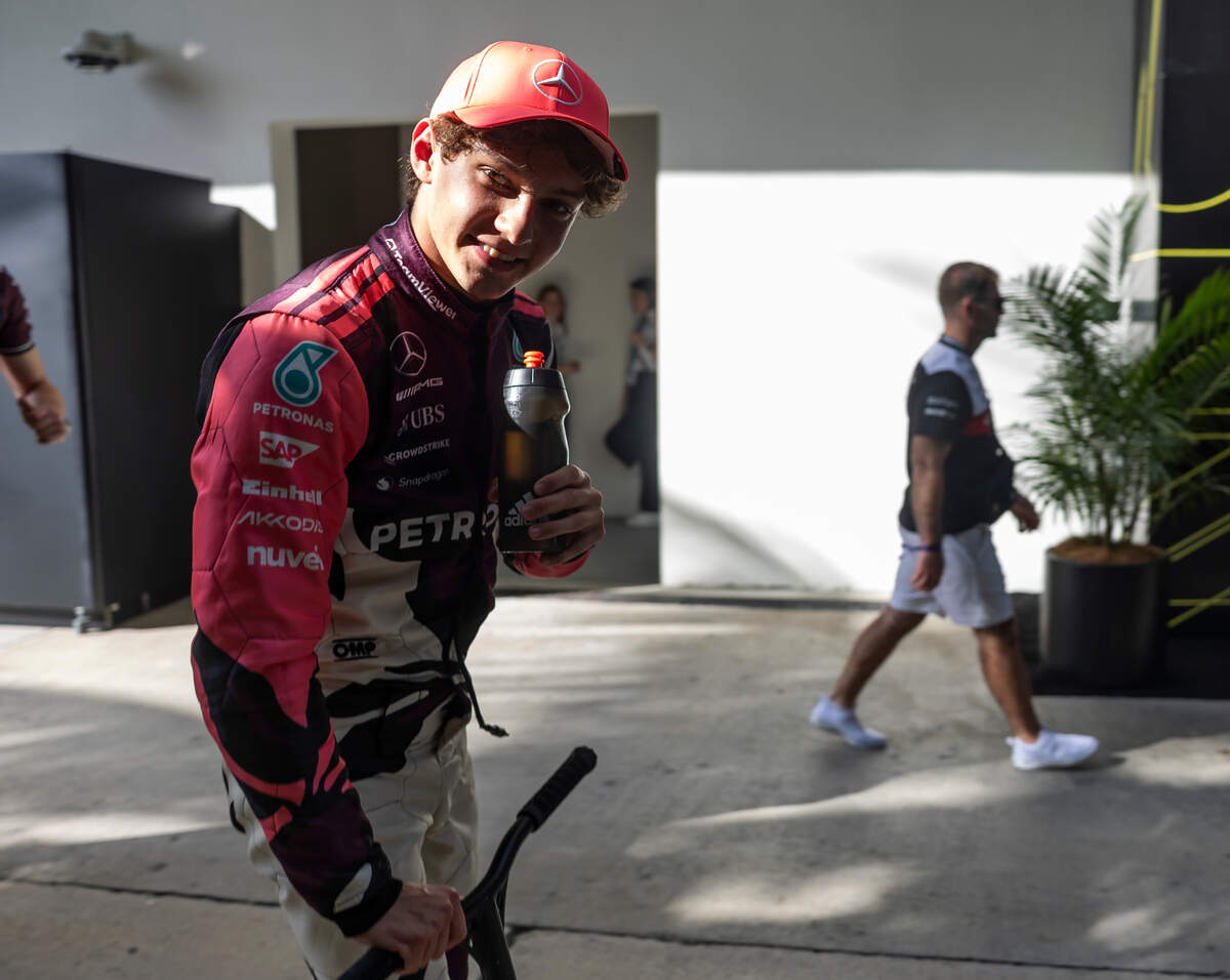 Mercedes driver Andrea Kimi Antonelli of Italy rides a scooter in the paddock after placing first in a Sprint Qualifying session on the first day of the Formula One Miami Grand Prix at the Miami International Autodrome on Friday, May 2, 2025, in Miami Gardens, Fla.