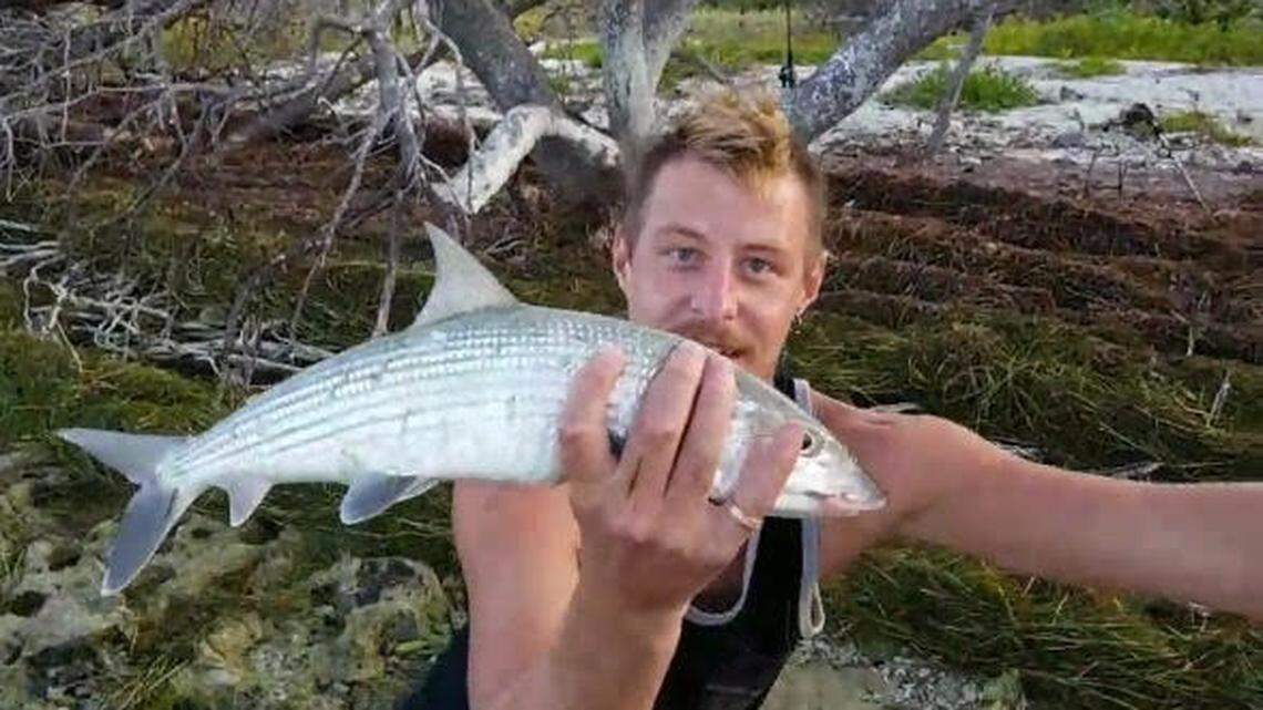 A man the Florida Fish and Wildlife Conservation Commission identifies as Alec Ludford of Virginia Beach, is seen holding a bonefish on Molasses Key on Dec. 25, 2018. FWC investigators say Ludford kept the fish, which is a protected species in Florida.