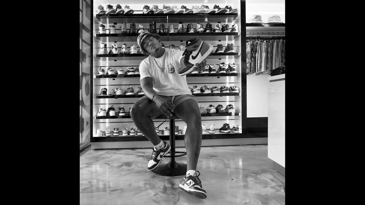 Entrepreneur Mahlik Hunt’s connection with fashion serves as a reminder of the influences of Black culture and style. He frequently shops at the Miami Gardens apparel shop Achille Miami as a way to remain connected to his Black community.