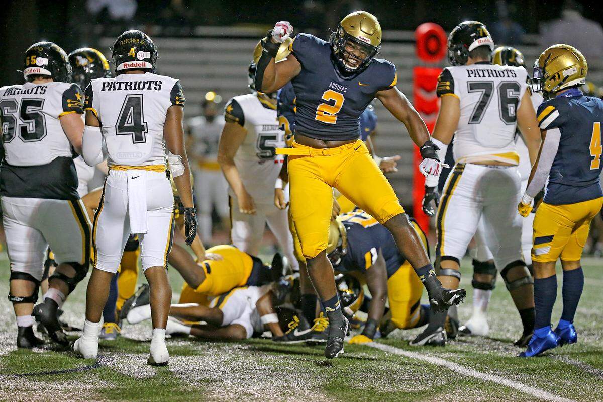 St Thomas Aquinas HS Tyreak Sapp (2) after a stop as they play American Heritage HS at St Thomas Aquinas HS in Fort Lauderdale, Florida, Friday, November 6, 2020.