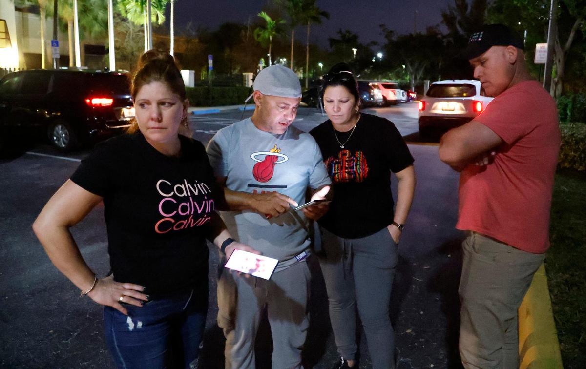 Yanet Gonzalez Diaz hopes to find her two sons she has not heard from since Dec. 31, 2022. Carel Nicot, Yunieska Gonzalez and Yosvani Moreno also wait for Cuban family members to arrive at the U.S. Border Patrol Station in Dania Beach, Florida, on Thursday, Jan. 5, 2023.