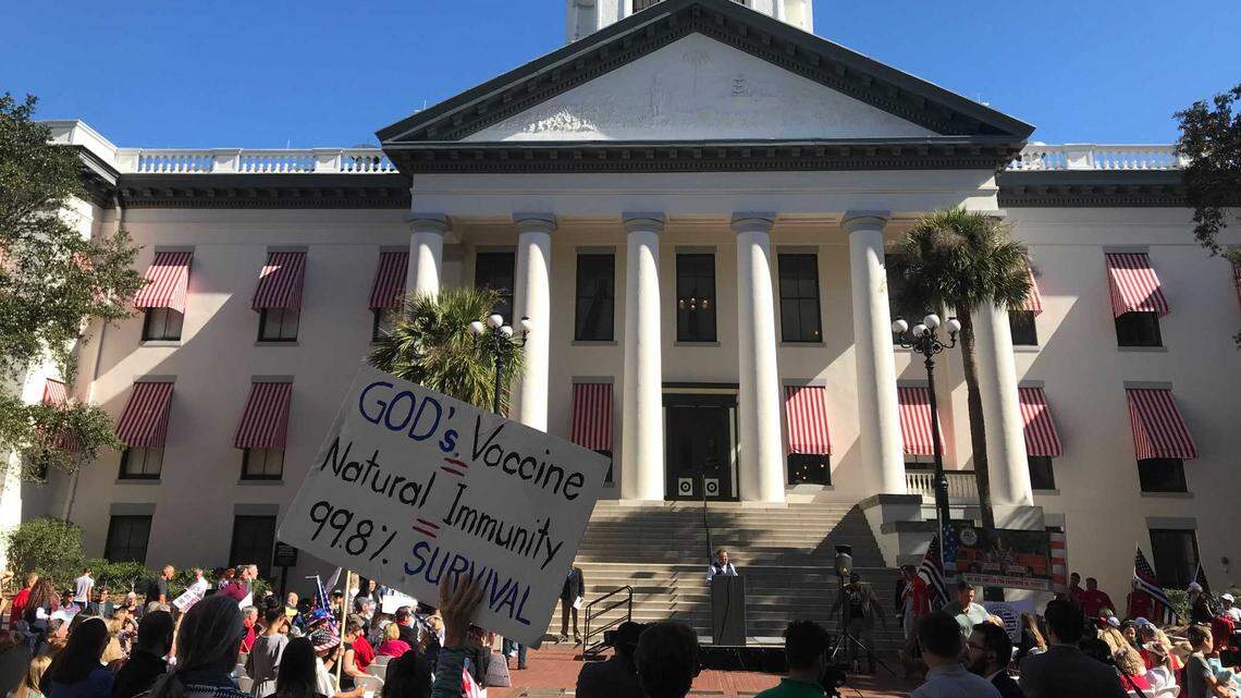 Anti-mandate protesters stage a rally near Florida’s Old Capitol on Tuesday, Nov. 16, 2021. Just a few hundred feet away, lawmakers debated a series of bills that were meant to push back against federal COVID-19 vaccine mandates.