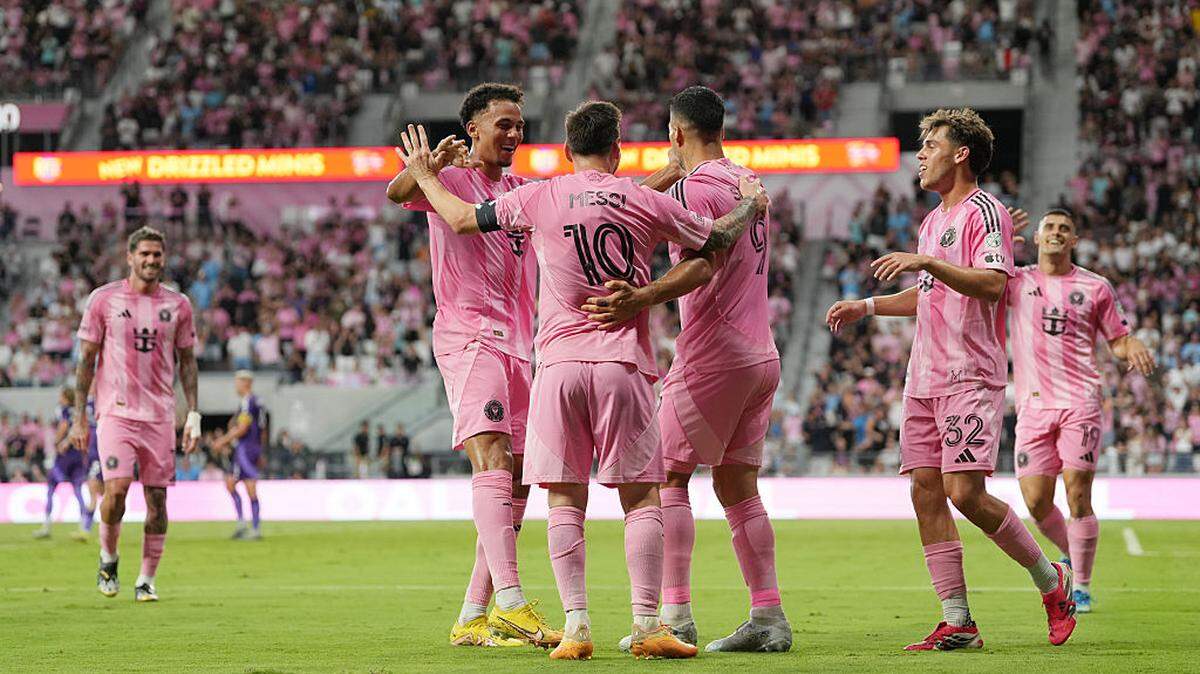 Lionel Messi #10 of Inter Miami CF celebrates with teammates after scoring his team's third goal during the MLS match between Inter Miami CF and Orlando City SC at Nu Stadium on May 02, 2026 in Miami, Florida.