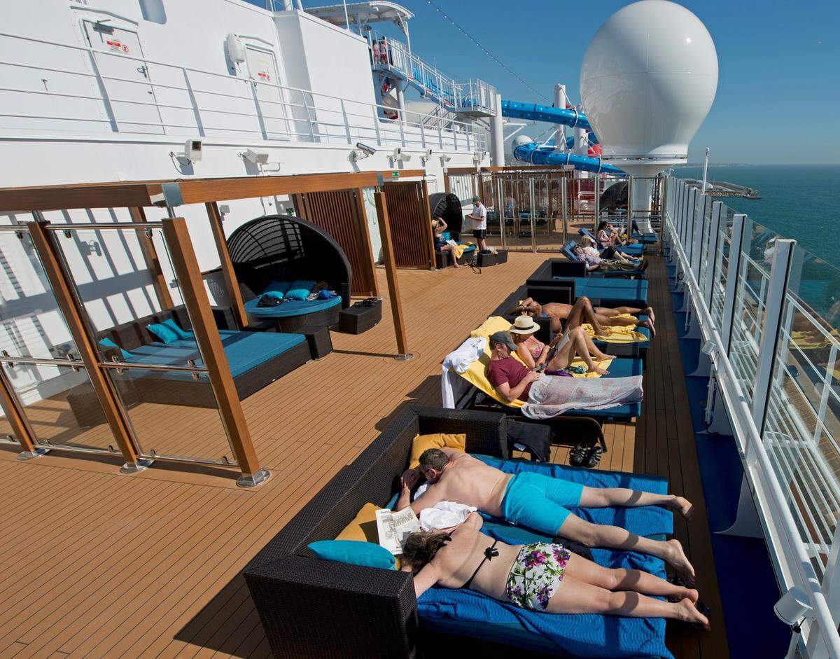 Guests aboard the Carnival Horizon relax in Serenity, an adults-only area of the cruise liner.