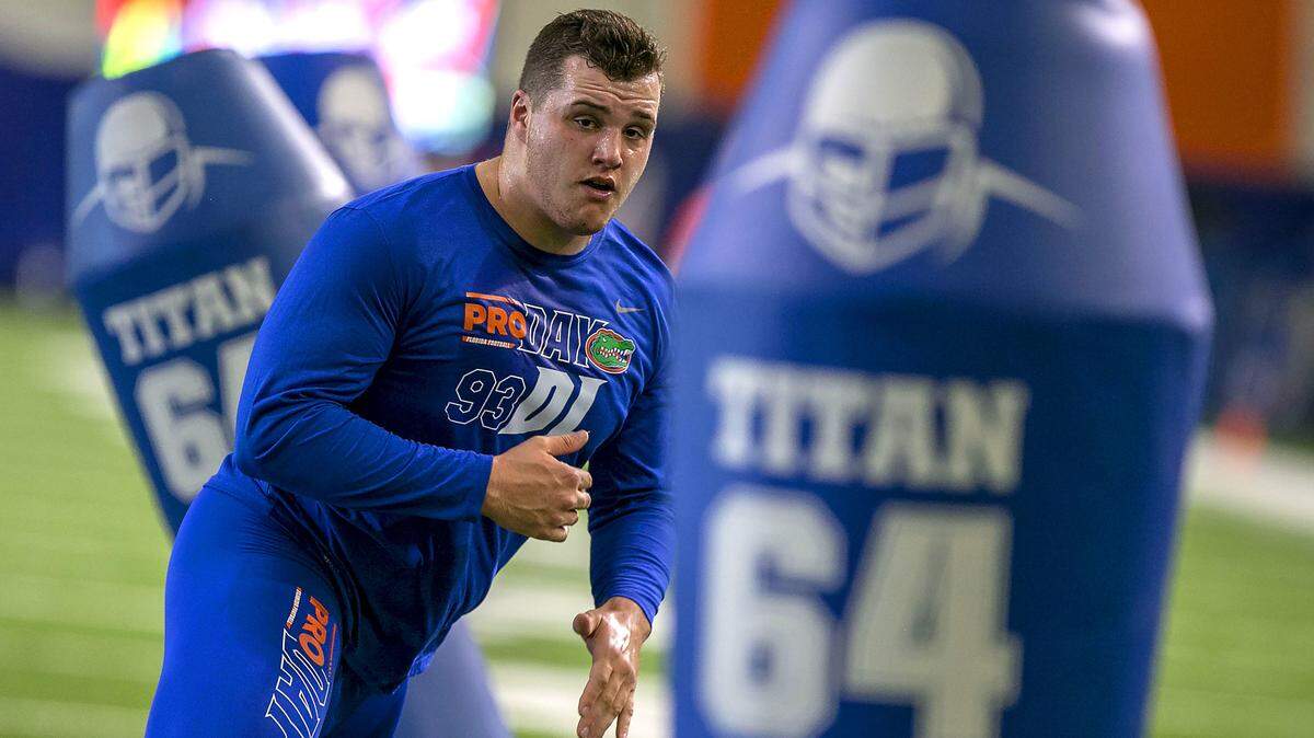 Defensive lineman Taven Bryan works a defensive drill during Florida's Pro Day at the University of Florida indoor practice facility, Wednesday, March 28, 2018,  in Gainesville.