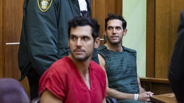 Alon Alexander, 37, right, and his twin brother, Oren, left, attend their bond hearing at the Richard E. Gerstein Justice Building on Dec. 13, 2024, in Miami. The Alexanders have been charged with multiple state and federal crimes, including sex trafficking and rape. (Matias J. Ocner/Pool/Getty Images/TNS)