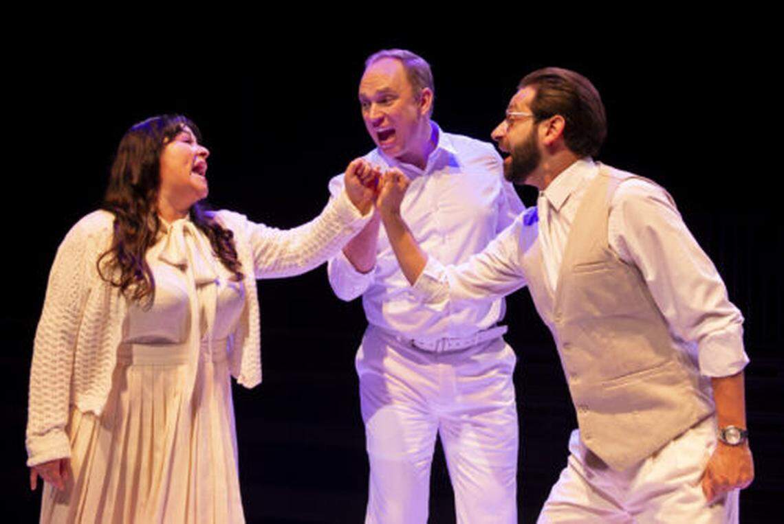 Joline Mujica, Alex Jorth, and John Reed singing “Old Friends” and pinky swearing to be friends forever in Stephen Sondheim’s “Merrily We Roll Along,” now at Zoetic Stage through April 5.