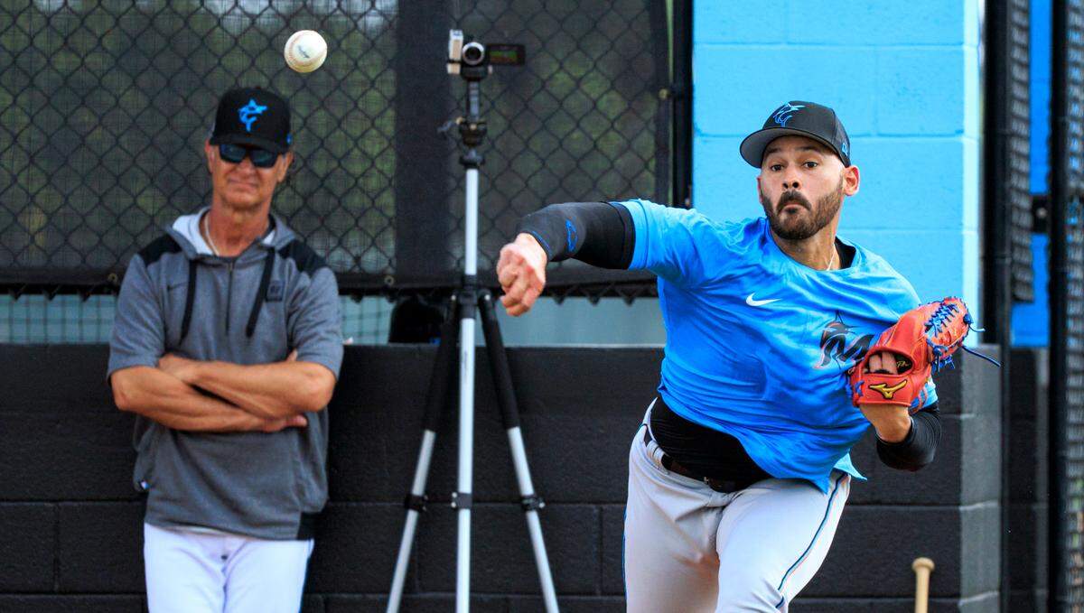 Miami Marlins manager Don Mattingly looks as Marlins pitcher Pablo Lopez throws during their spring training workout at Roger Dean Stadium on Thursday, March 17, 2022 in Jupiter, FL.