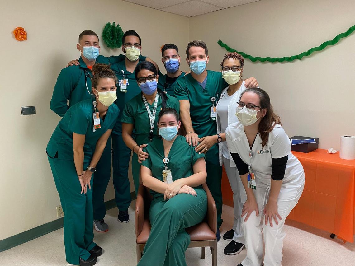  Nurse Lauren Caldevilla, seated, is a University of Miami nurse educator who took on training medical staff in the COVID unit at the beginning of the pandemic. The first critical care graduation of nurses was in August 2020. UM nurse educator Diana Levy designed the UHealth residency program in five weeks.