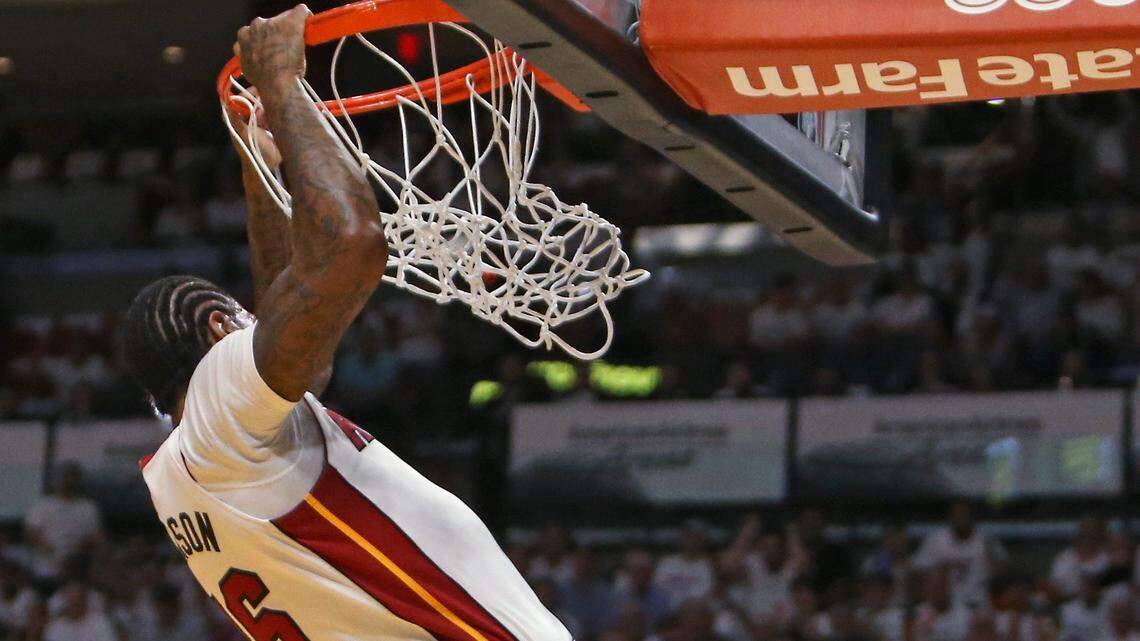 Miami Heat forward James Johnson dunks against Philadelphia 76ers forward Dario Saric during the first quarter of in Game 3 of a first-round NBA basketball playoff series at AmericanAirlines Arena in Miami on Thursday, April 19, 2018.  Johnson underwent sports hernia surgery this offseason.