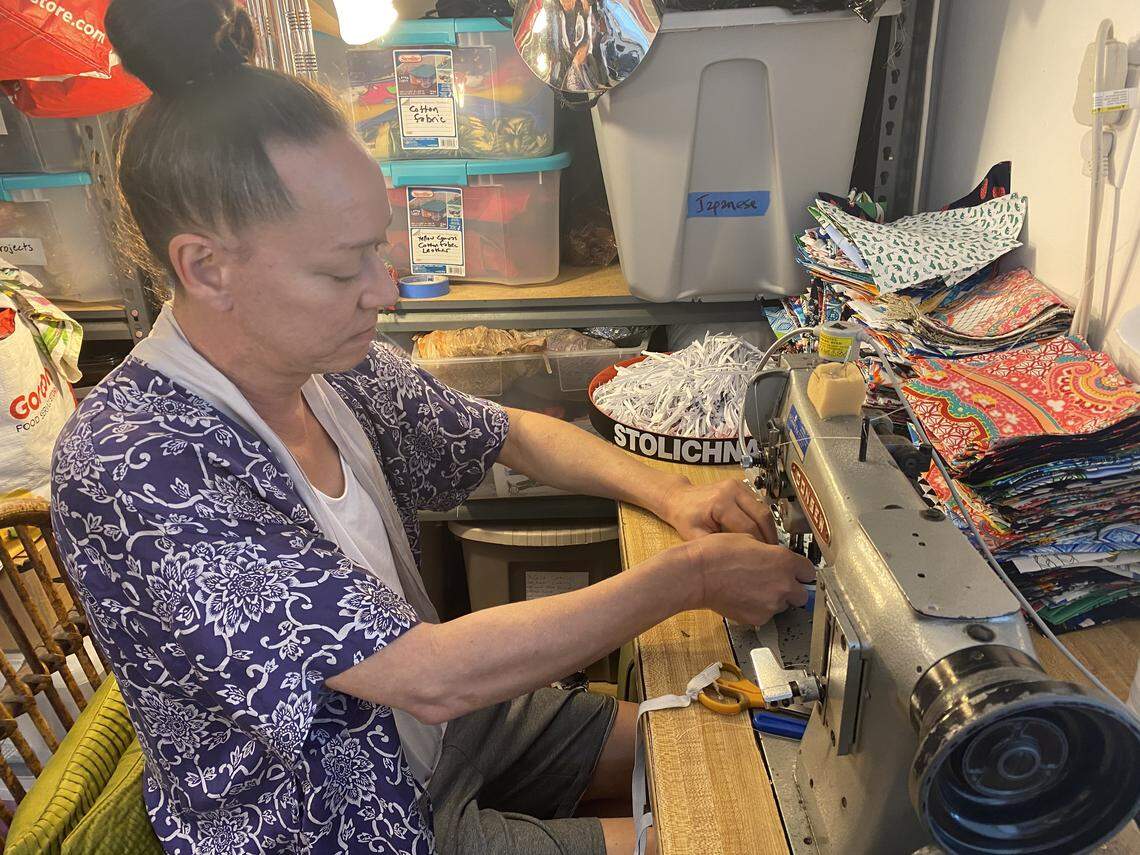 Gary “Sushi” Marion, who owns a drag queen cabaret show in Key West, sews masks at home on April 17, 2020, as a fundraiser for the out-of-work performers.
