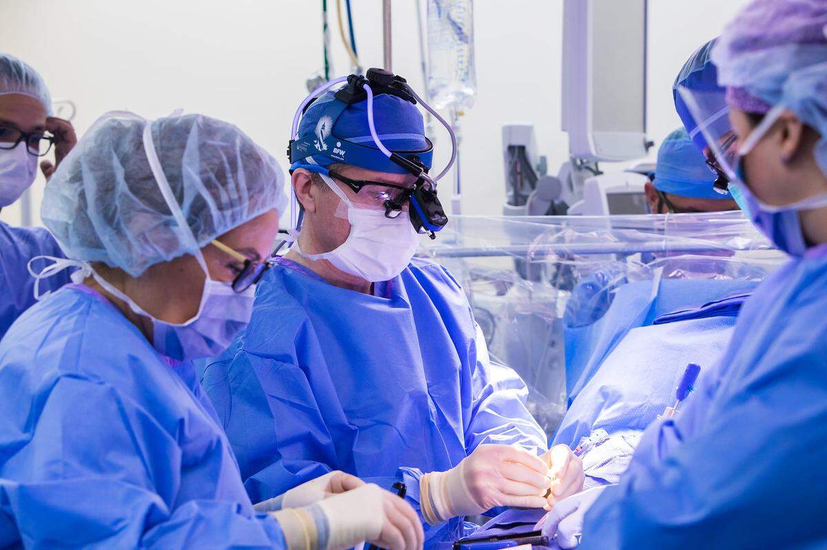 Dr. Joseph Lamelas, chief and program director of cardiac surgery at University of Miami Health System, operates on a patient, pioneering a minimally invasive heart valve procedure he coined “The Miami Method.”