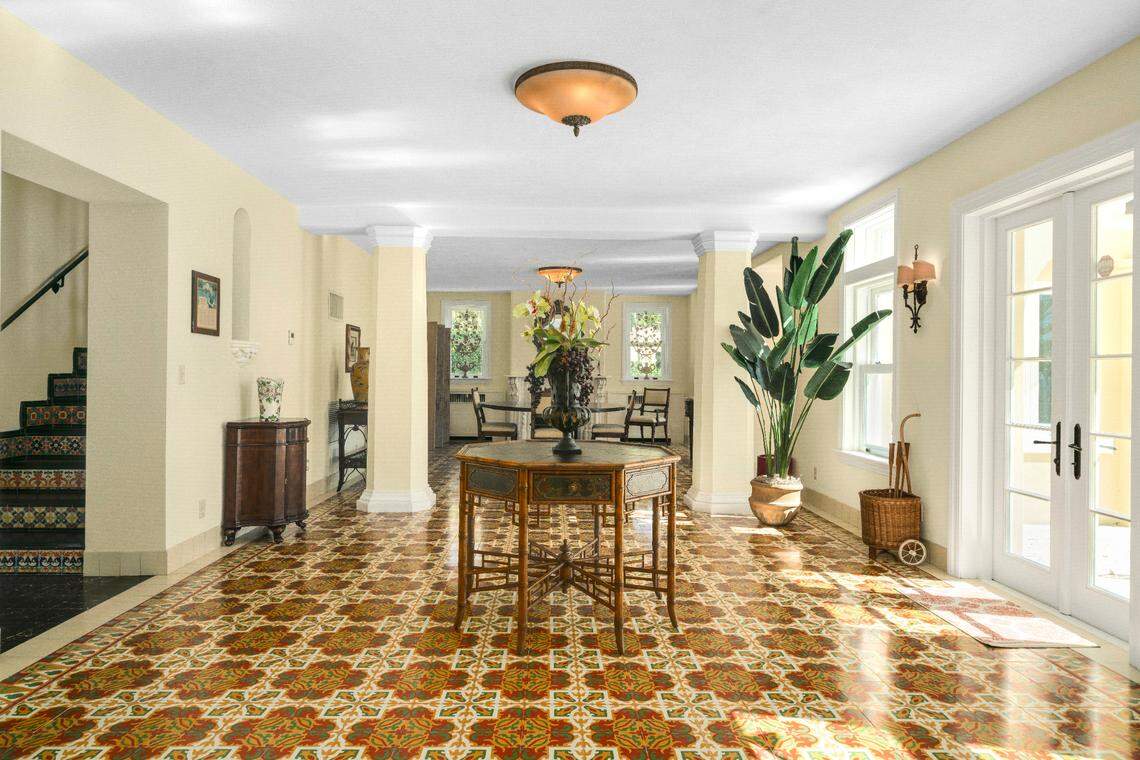 Here are the living and dining rooms at the restored Villa Serena, William Jennings Bryan’s historic Miami home, featuring the original tiles brought from Cuba by his wife, Mary Baird.