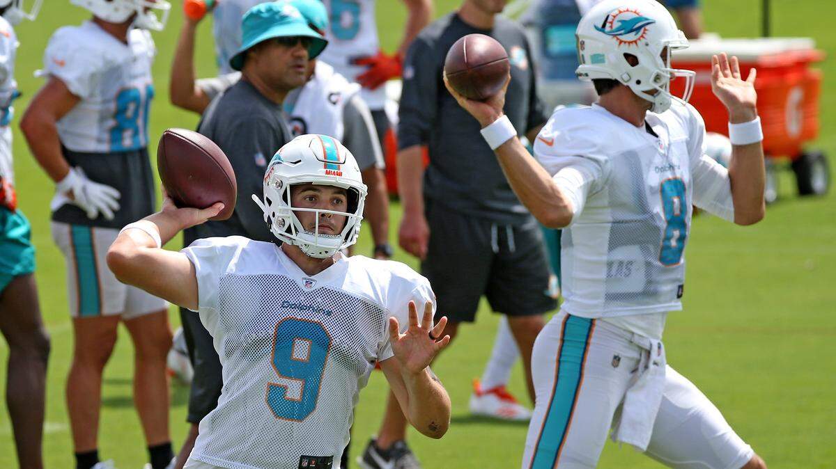 Brock Osweiler, right, and not David Fales will be Ryan Tannehill’s backup Sunday against the Titans.