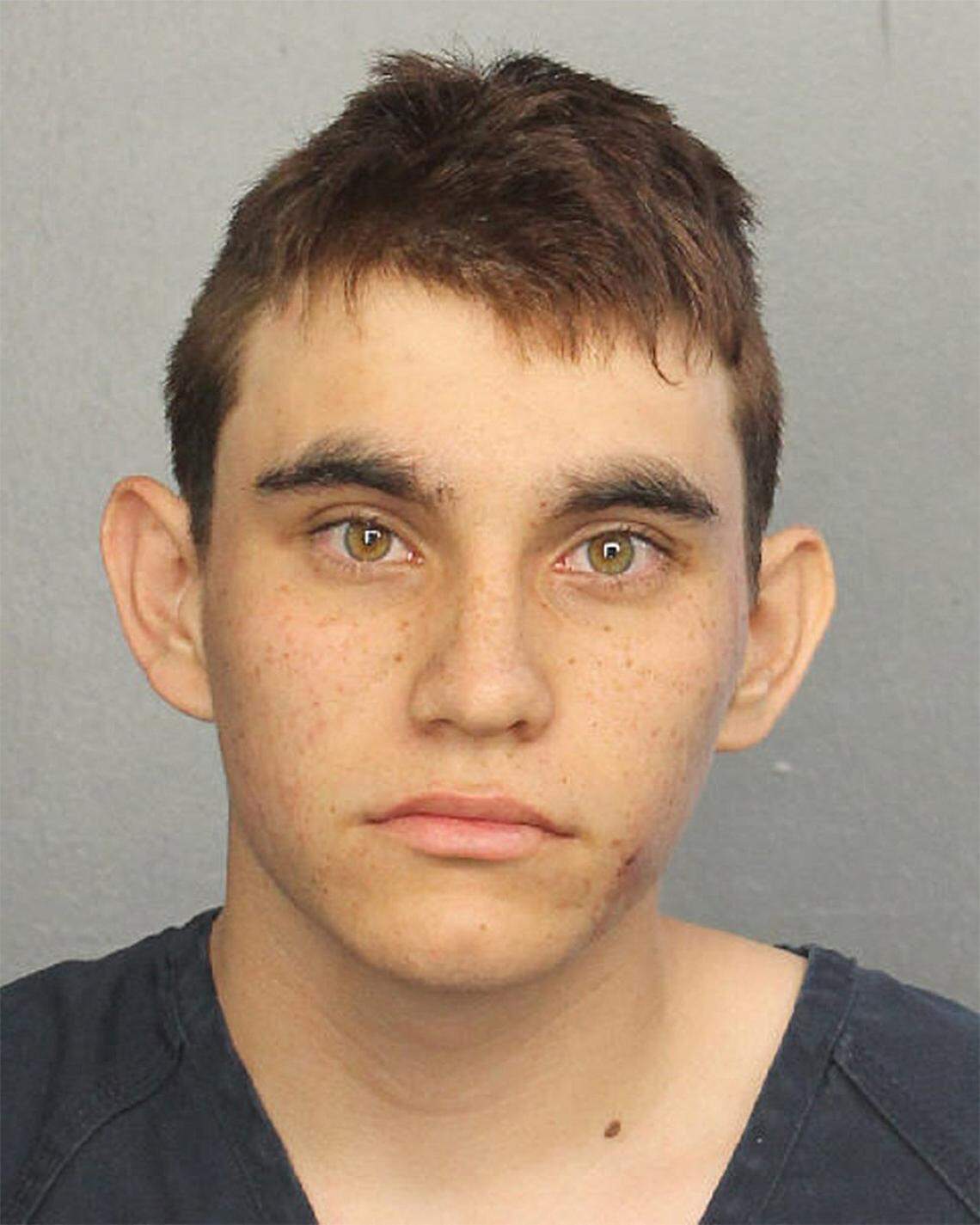 Nikolas Cruz stands for his mug shot.