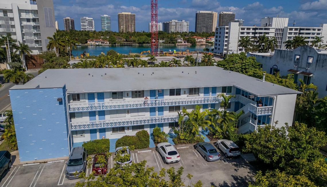 An overhead view shows the extensively refurbished Golden Key Condominiums in Bay Harbor Islands. The managers of the modest 1960s condo have maintained affordability for owners while successfully navigating recertification and stringent new post-Surfside state regulations.