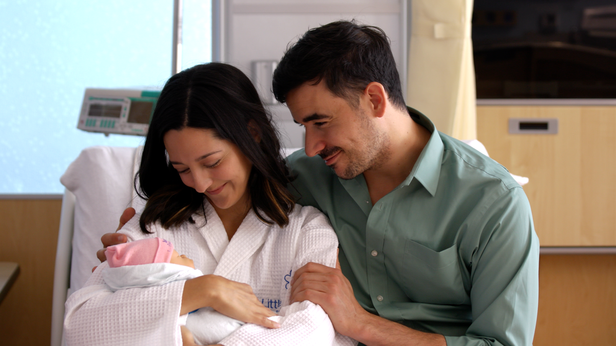 Actors Adriana DeGirolami and Nick Ducassi portray an expectant couple in a still from the The Plantain’s commercial spot for Jackson Health System’s maternity ward in Miami.