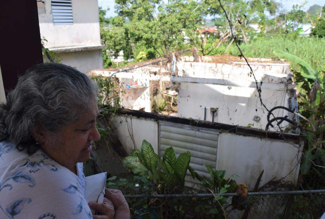 Iris Ortiz of Corozal, Puerto Rico, lost her roof during Hurricane Maria in 2017. Although she received money to fix it, she says it’s not nearly enough to begin the repairs. She’s among the 25,000-30,000 people In the U.S. territory who are still living under temporary roofs — or have none at all — two years after Maria made landfall.  